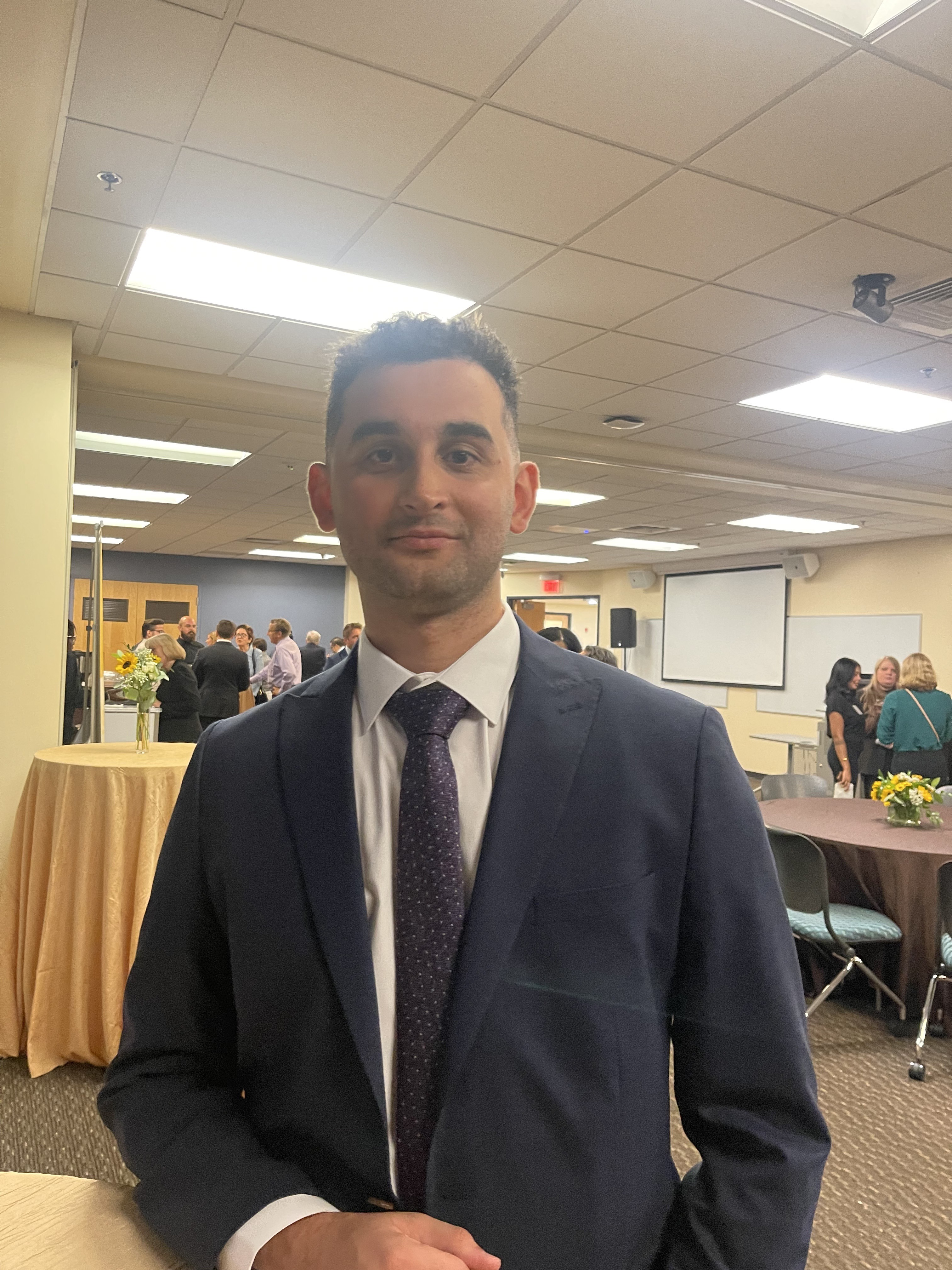 Emre Can Aslan as a visiting researcher at Rowan University, New Jersey, USA, in formal attire